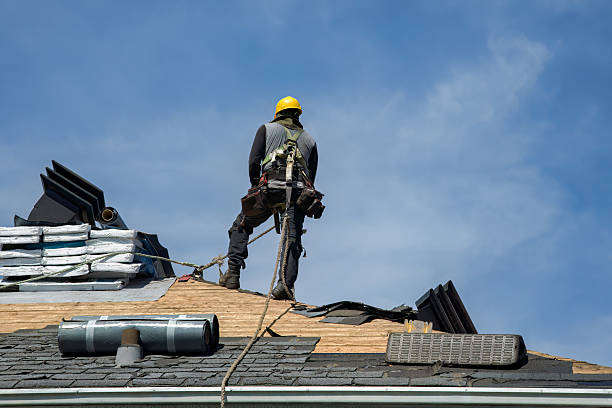 Professional Roofing technician working in Amherst, MA